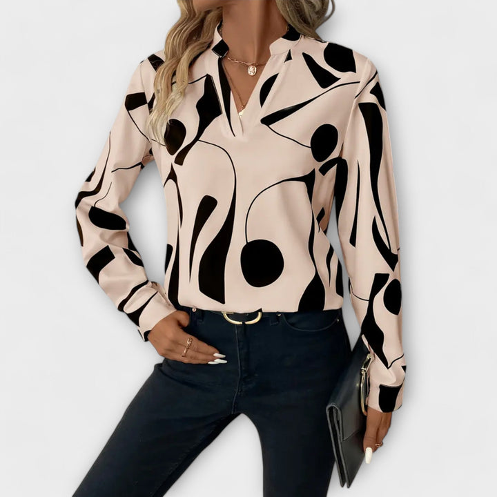 Elegant Women's Blouse with Abstract Pattern and Split Neckline