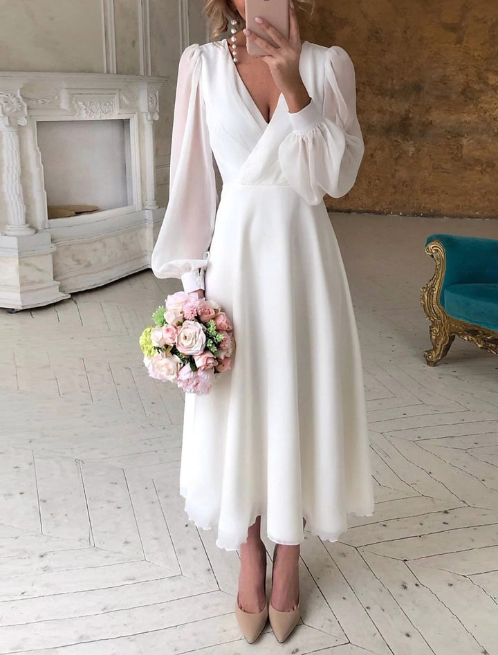 Elegant Flowing Long Sleeve Women's Wedding Dress